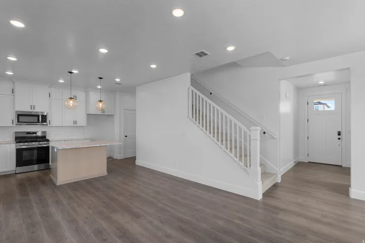 Kitchen and great room*Photos are of a similar home. Actual home will have slightly different features and selections