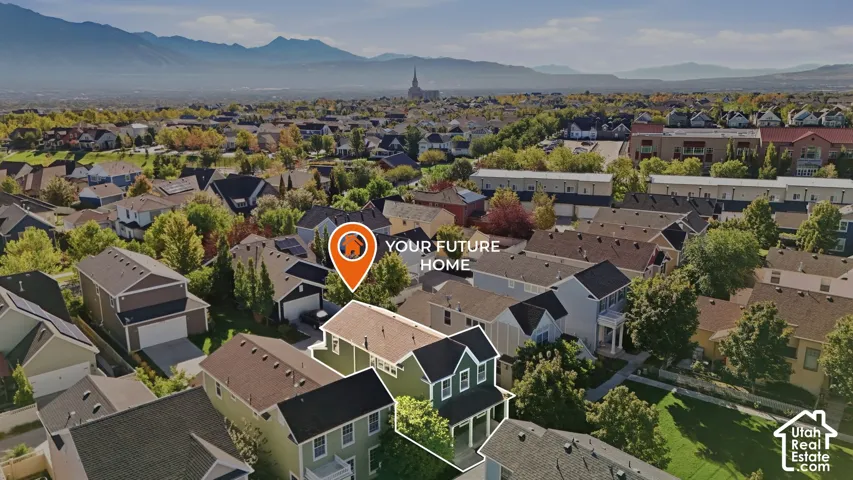 Aerial perspective showcasing a residential community with varied home designs and mature trees
