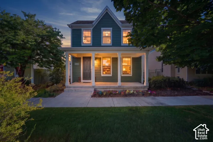 Two-story exterior with a gabled roofline and front porch