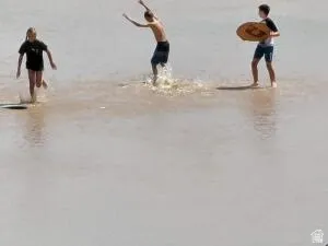 Quail Lake beach skim boarding activity