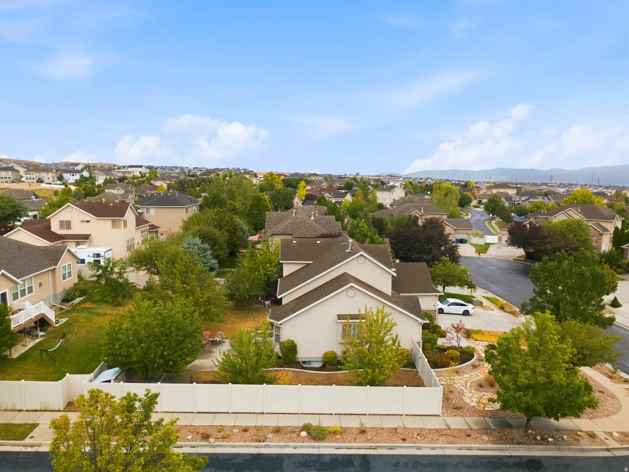 Expansive residential neighborhood featuring diverse architectural styles and mature landscaping