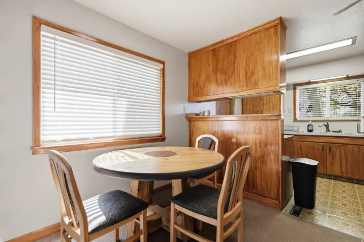 Wood-finish cabinetry and trim throughout