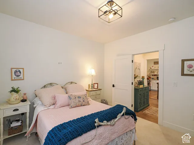 Recessed lighting and ceiling-mounted light fixture illuminate the space