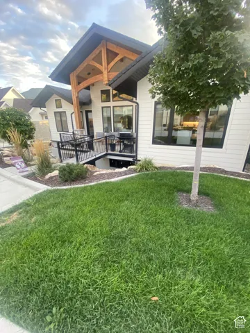 Modern exterior with white siding and black trim accents