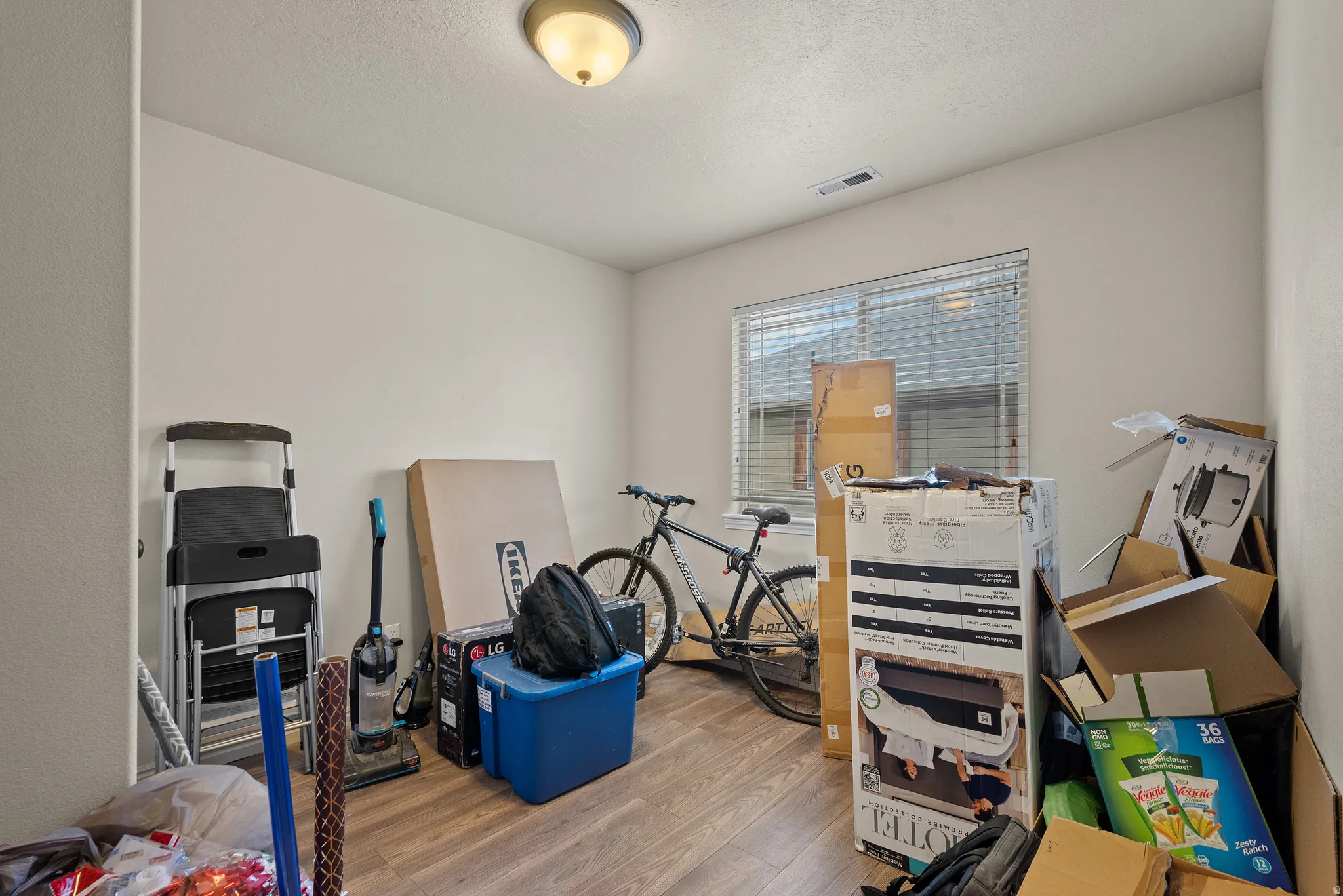 Wood-finish flooring with neutral wall tones
