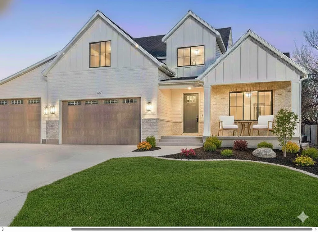 Contemporary exterior featuring white siding, light brick accents, a covered front porch, and a two-car garage with transom windows