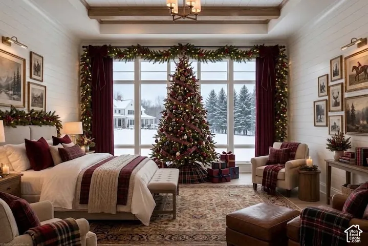 Tray ceiling with wood beam accents, shiplap wall finishes, large picture window, recessed lighting, and wall sconces