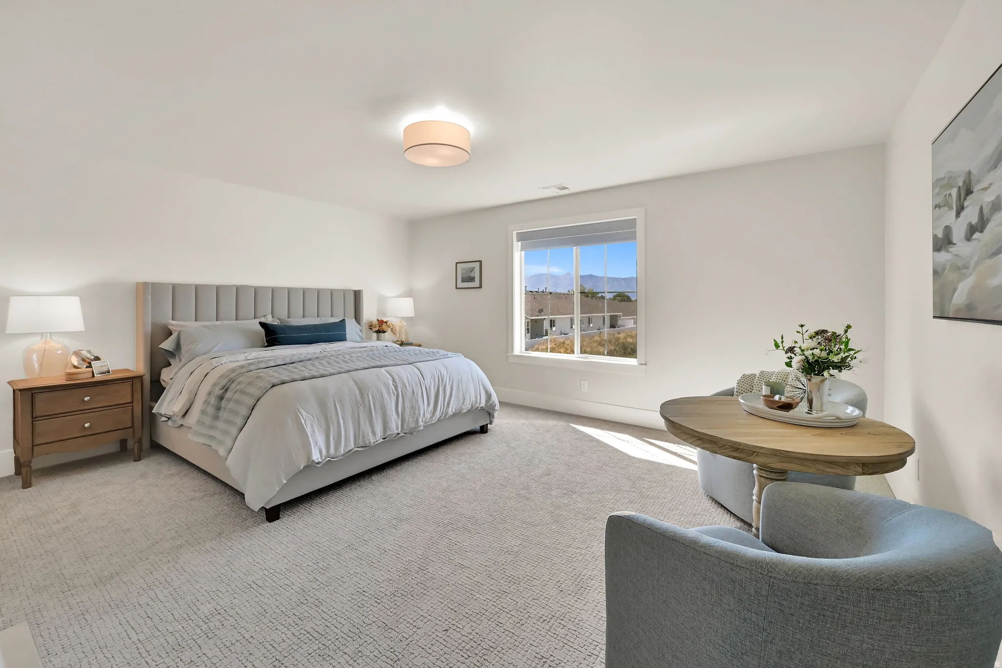 Recessed lighting, large window, carpet flooring, and a ceiling light fixture