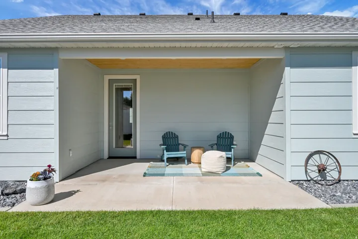 Paved patio with an overhead wood-finish ceiling