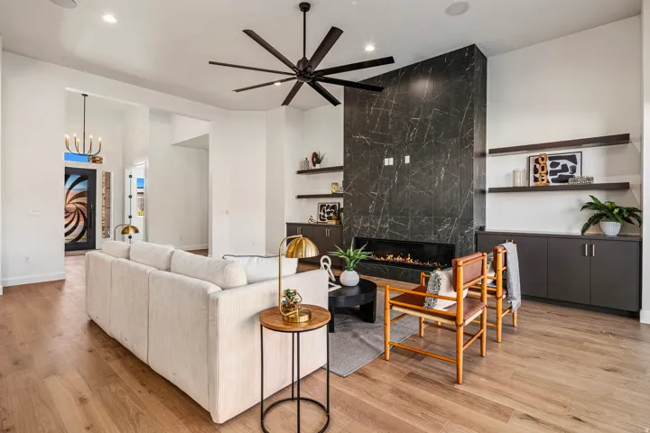 Wood-finish flooring, recessed lighting, and a modern ceiling fan