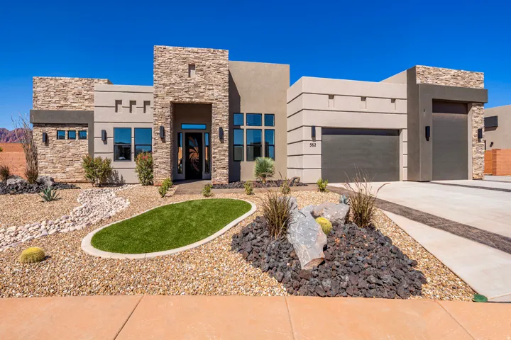 Modern architectural design featuring stone accents and stucco siding