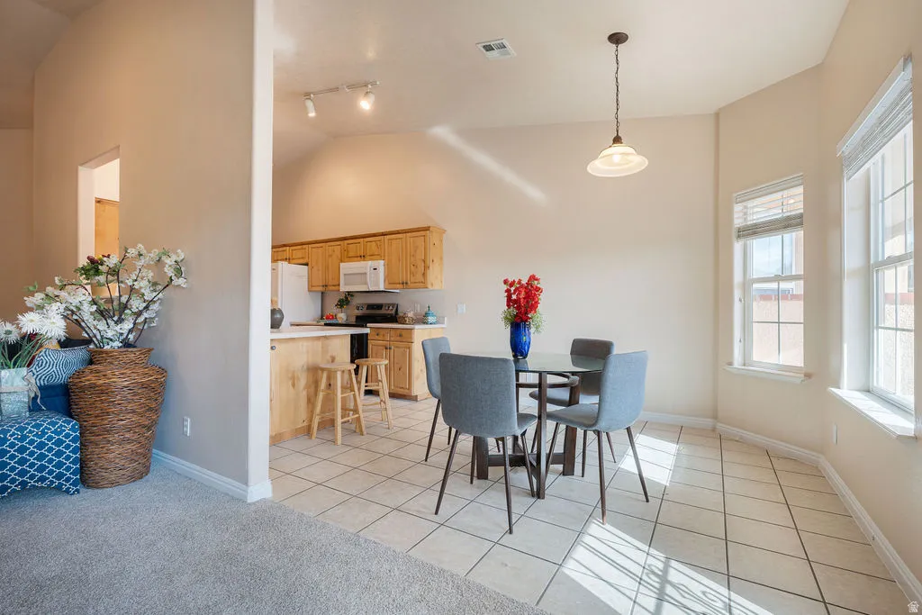 Vaulted ceilings in kitchen and dining area