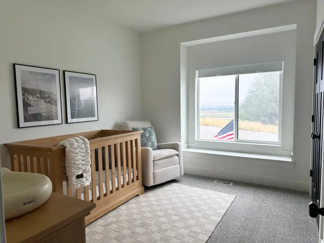 Recessed window with a built-in window seat, finished with white trim