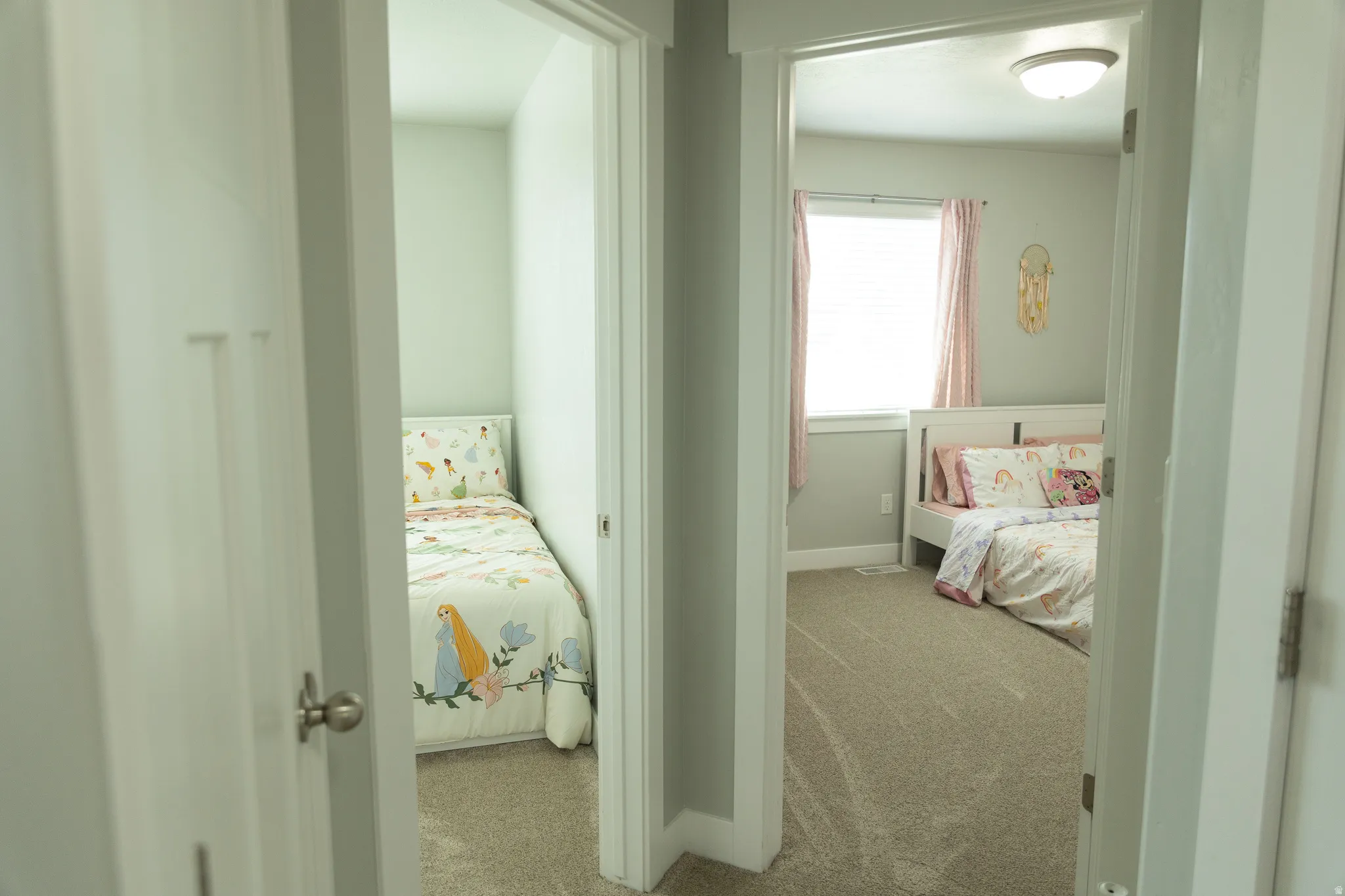 Neutral wall color in both rooms