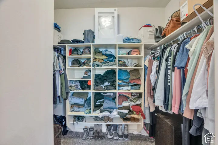 Built-in shelving with multiple cubbies and hanging storage