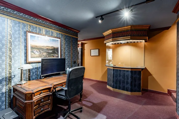 Office and area near the movie room