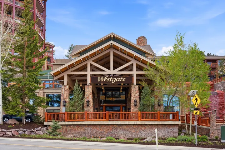 Stone and timber facade with prominent gabled entrance
