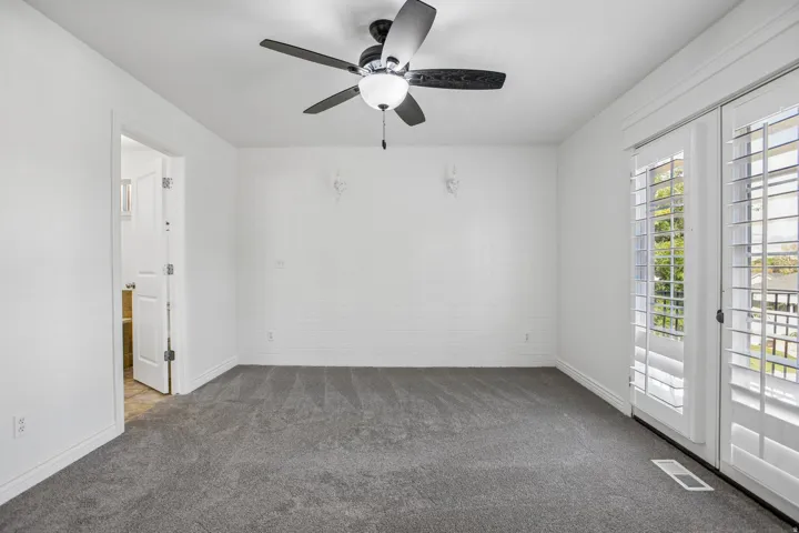 Primary Bedroom Suite with balcony