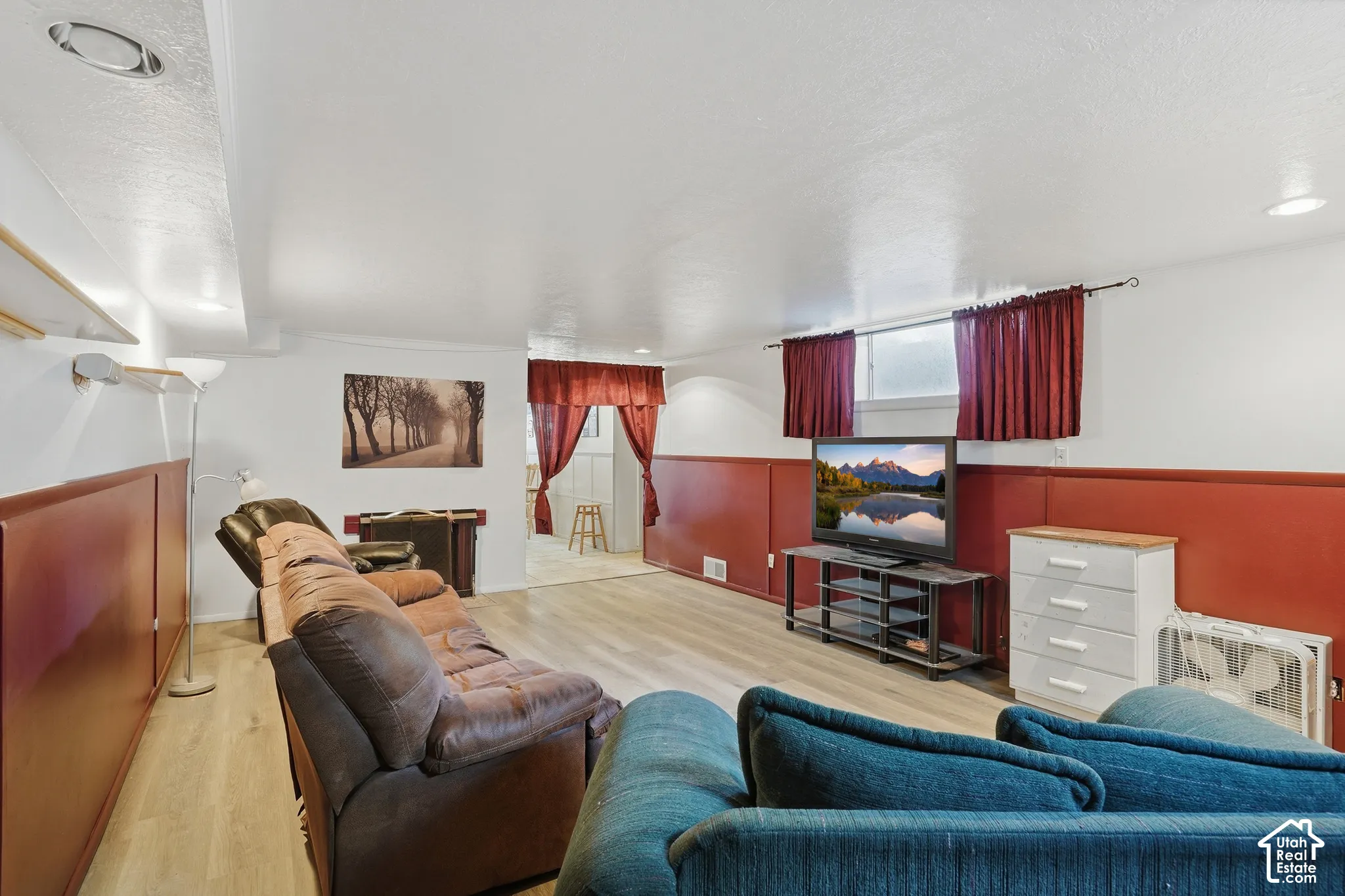 Remodeled basement living room with 2nd gas fireplace.