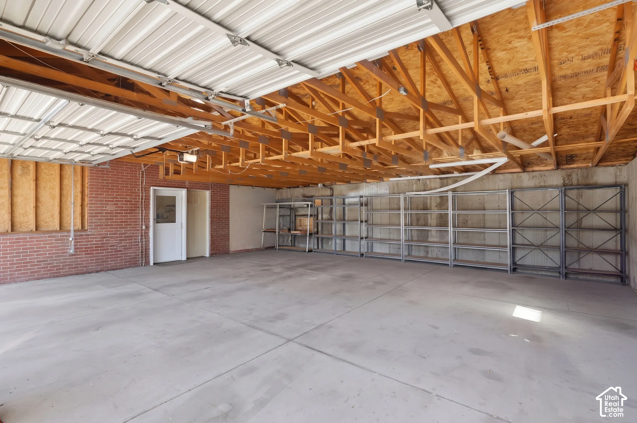 Oversized 3 car garage, items in garage virtually removed.