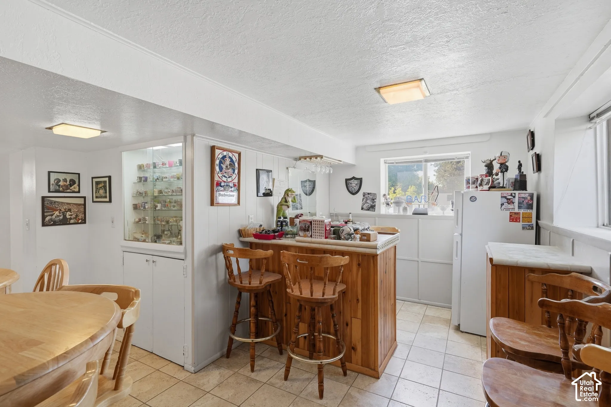 Wet bar next to living room.