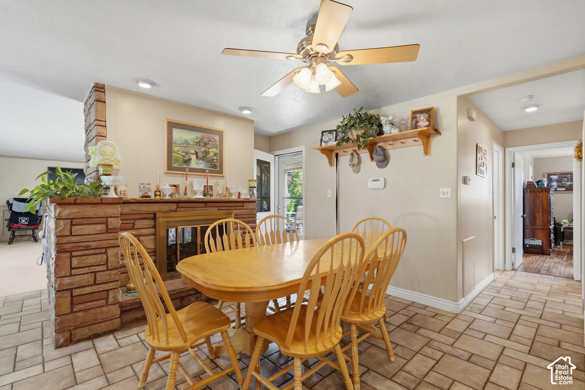 Semi Formal Dining area with double sided gas fireplace.