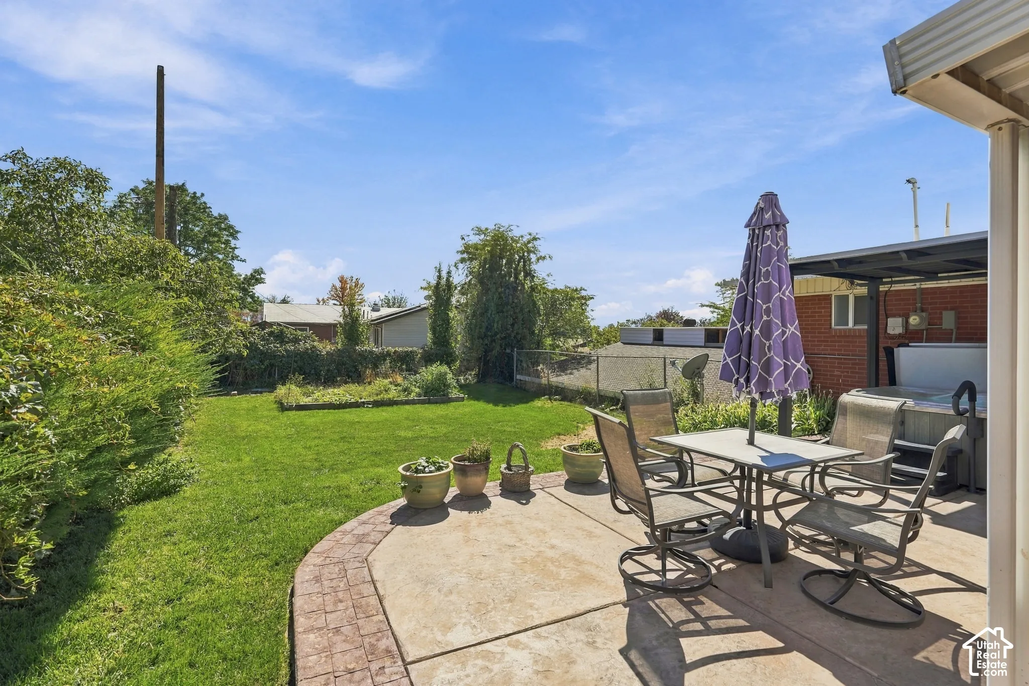 Backyard with stamped patio.