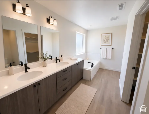 Dual vanity with integrated sinks and white countertops