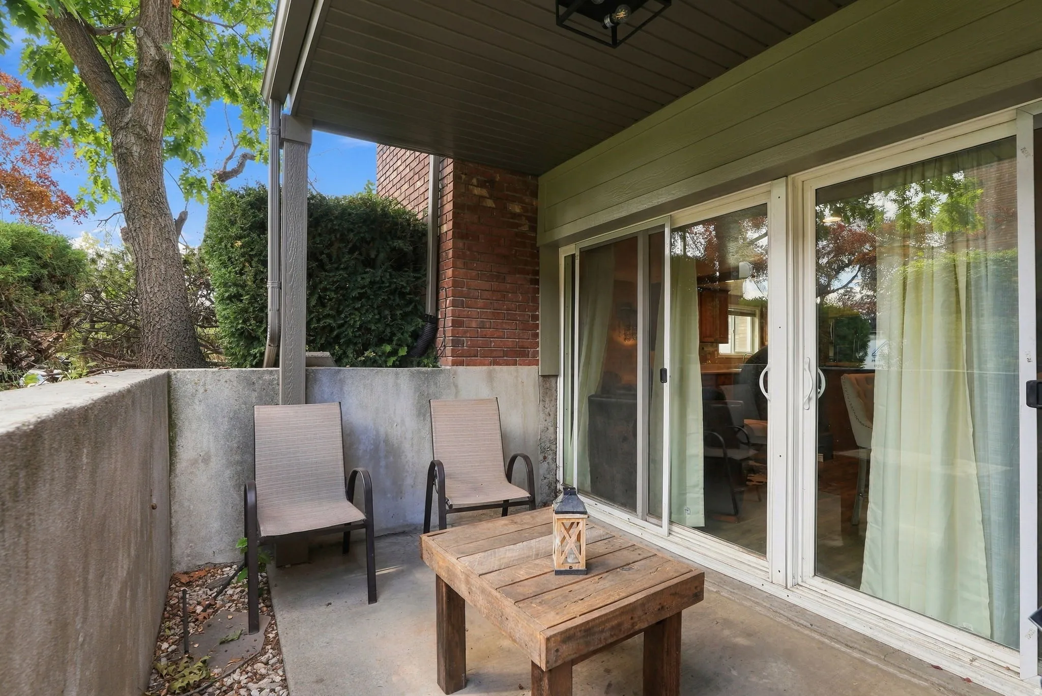 Covered patio with concrete flooring, recessed lighting, and direct access to interior via sliding glass doors