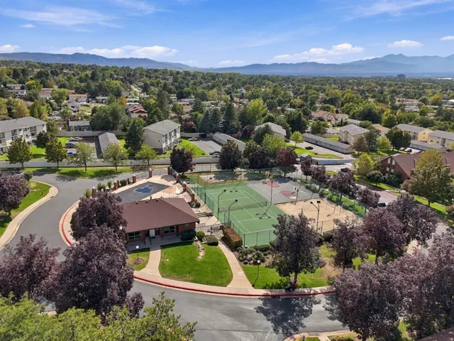 Community amenities featuring a clubhouse, outdoor pool, tennis courts, and basketball court
