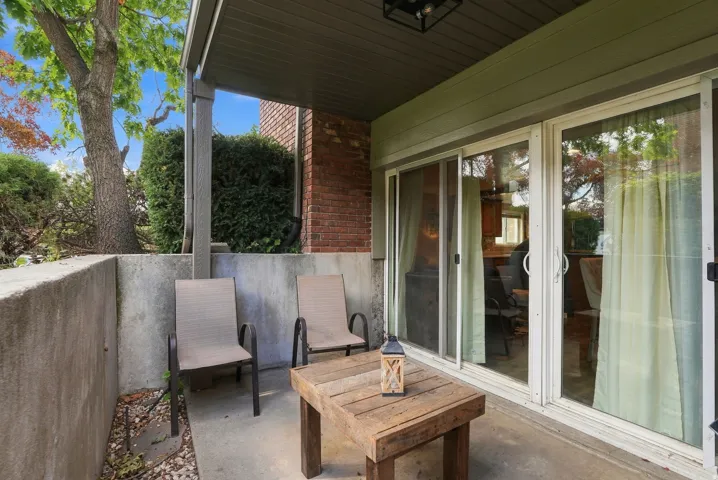 Covered patio with concrete flooring, recessed lighting, and direct access to interior via sliding glass doors