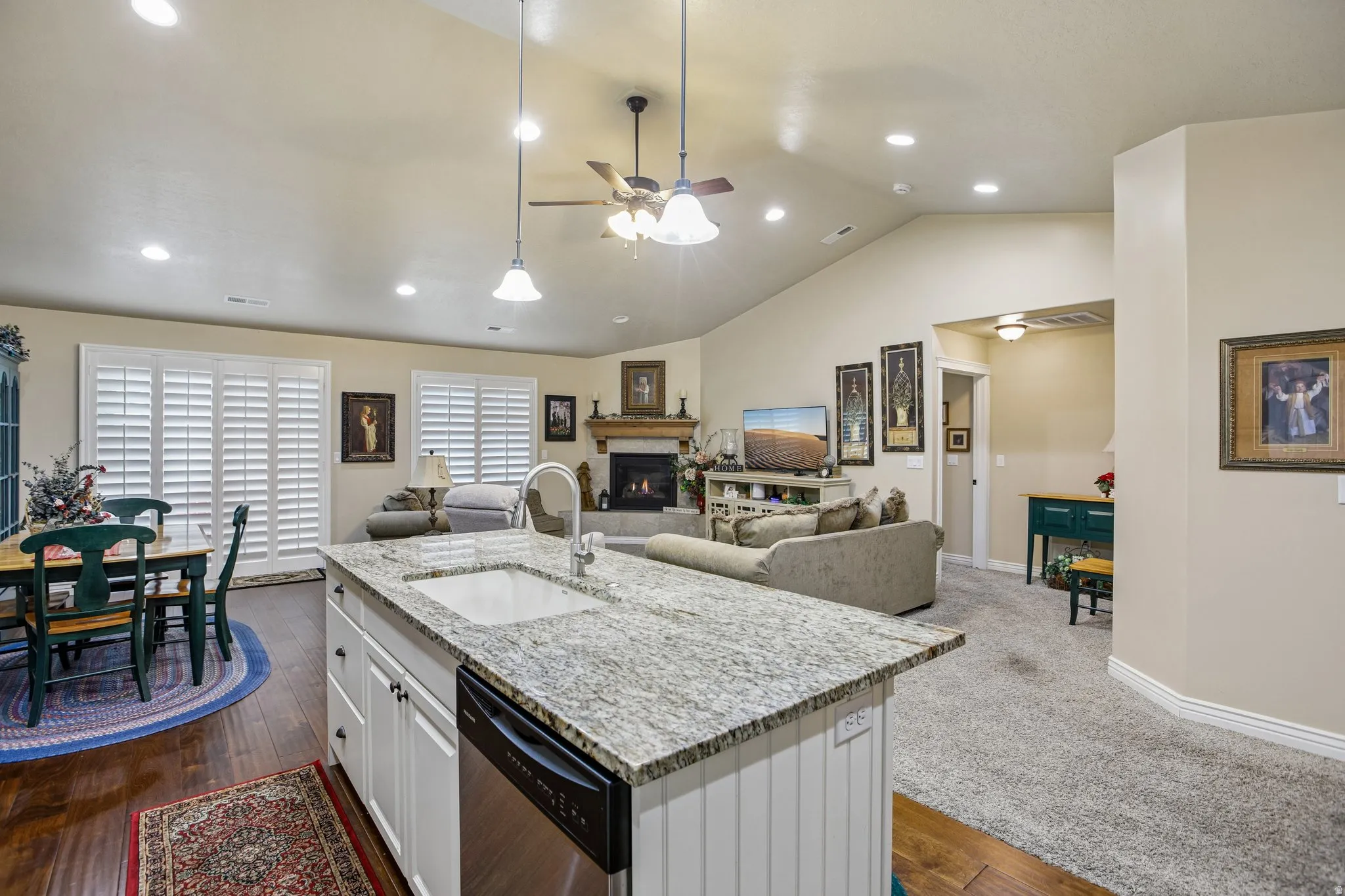 Kitchen island with built-in sink and stainless steel dishwasher