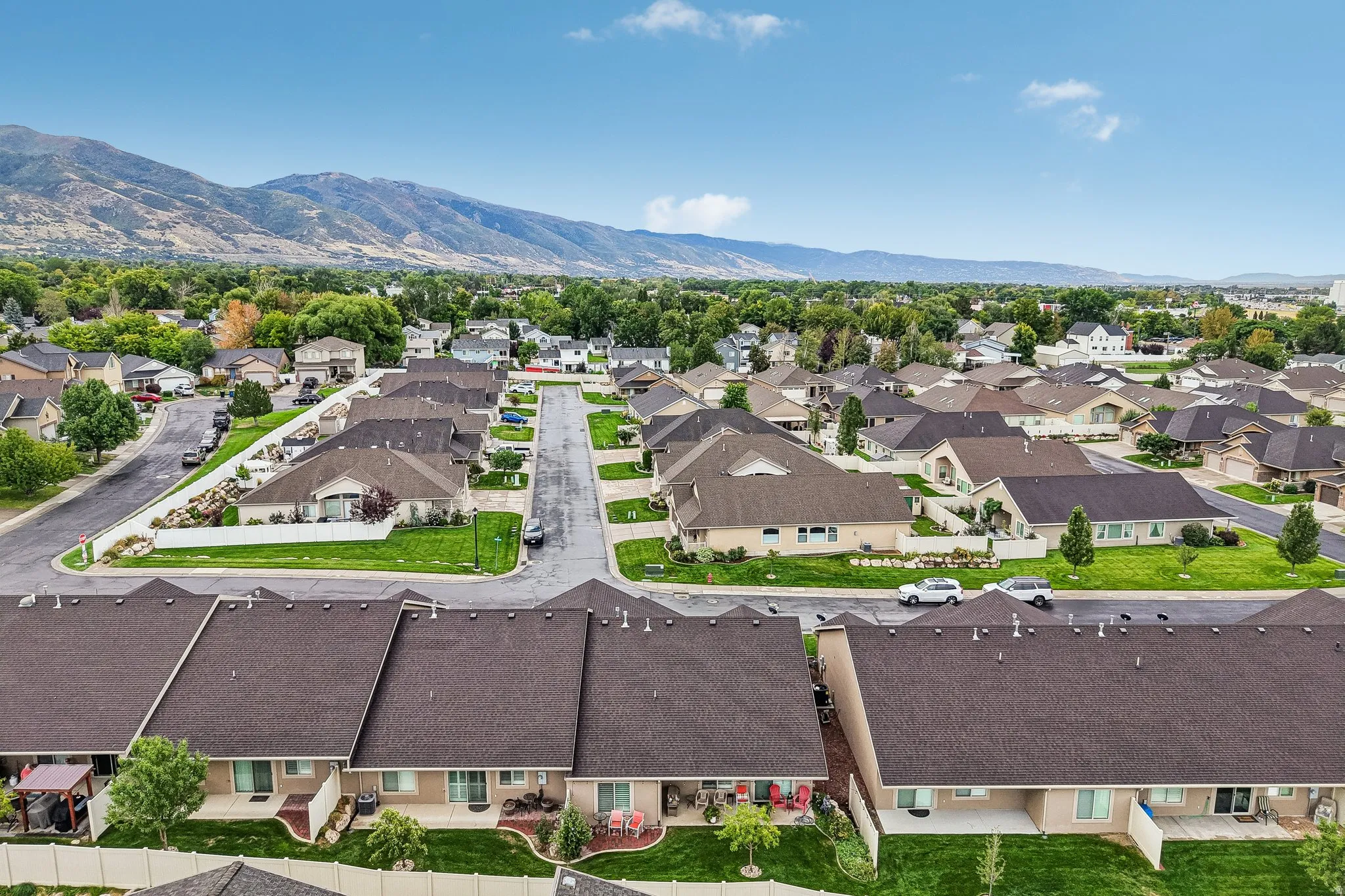 Neighborhood setting with mountain backdrop and residential streets