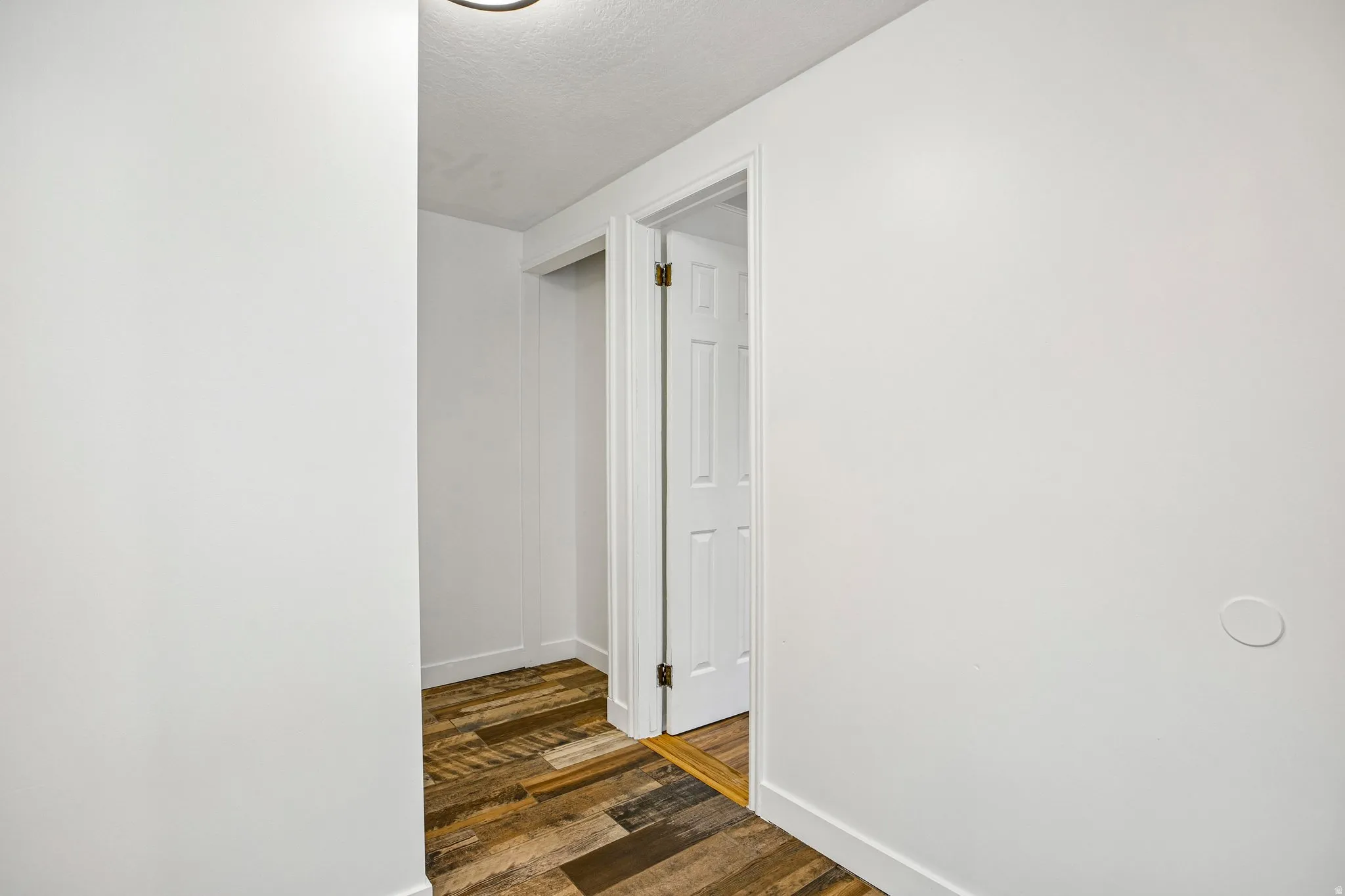 Wood-finish flooring with varied plank widths