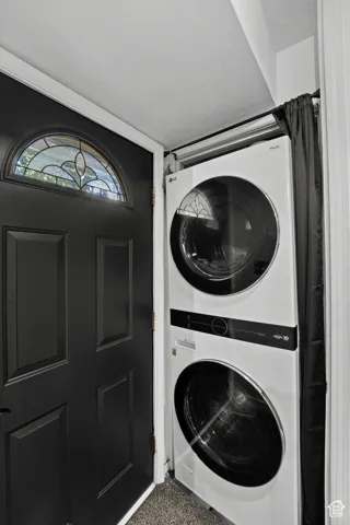 Black door with stained glass transom window