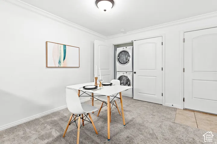 Dining area and Stackable Washer & Dryer Closet