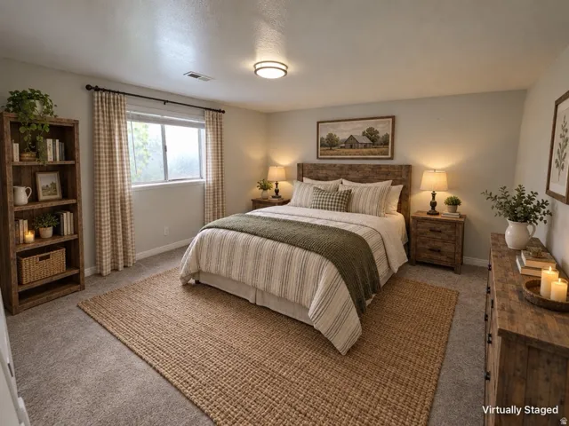 Ceiling-mounted flush light fixture, light gray wall paint, and carpet flooring