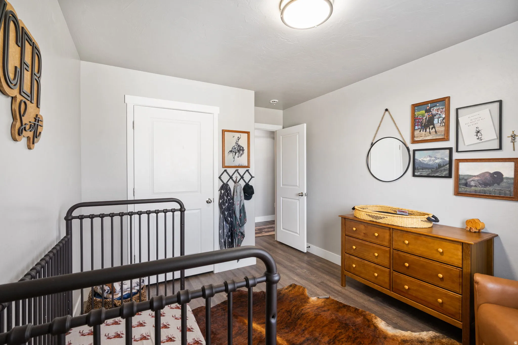 Wood-finish flooring with light gray wall tones