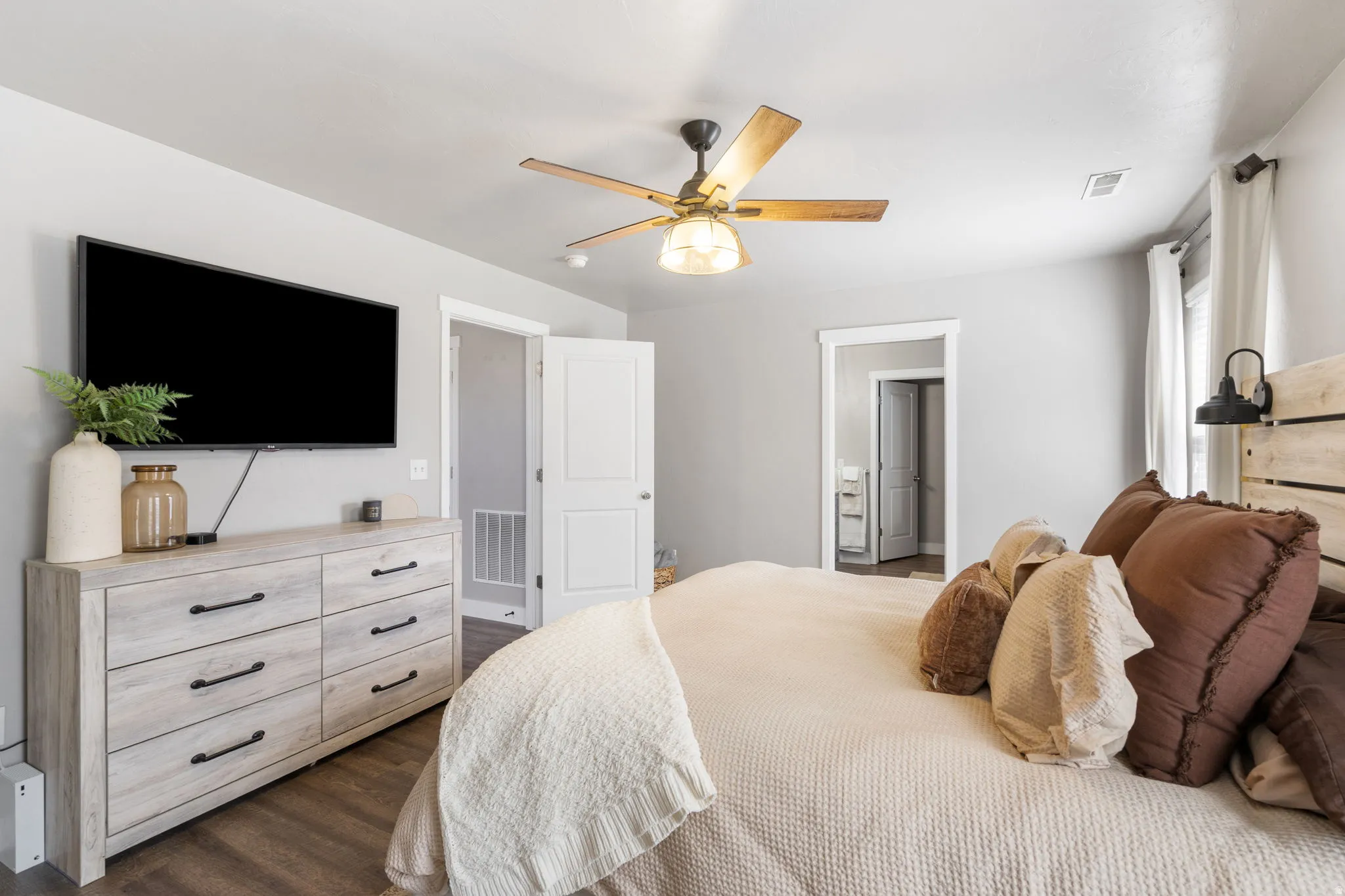 Wood-finish flooring with light gray walls