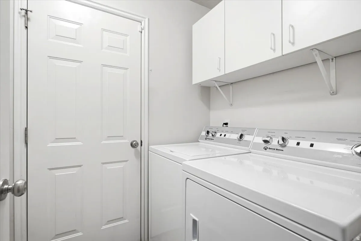 White cabinetry and shelving for storage