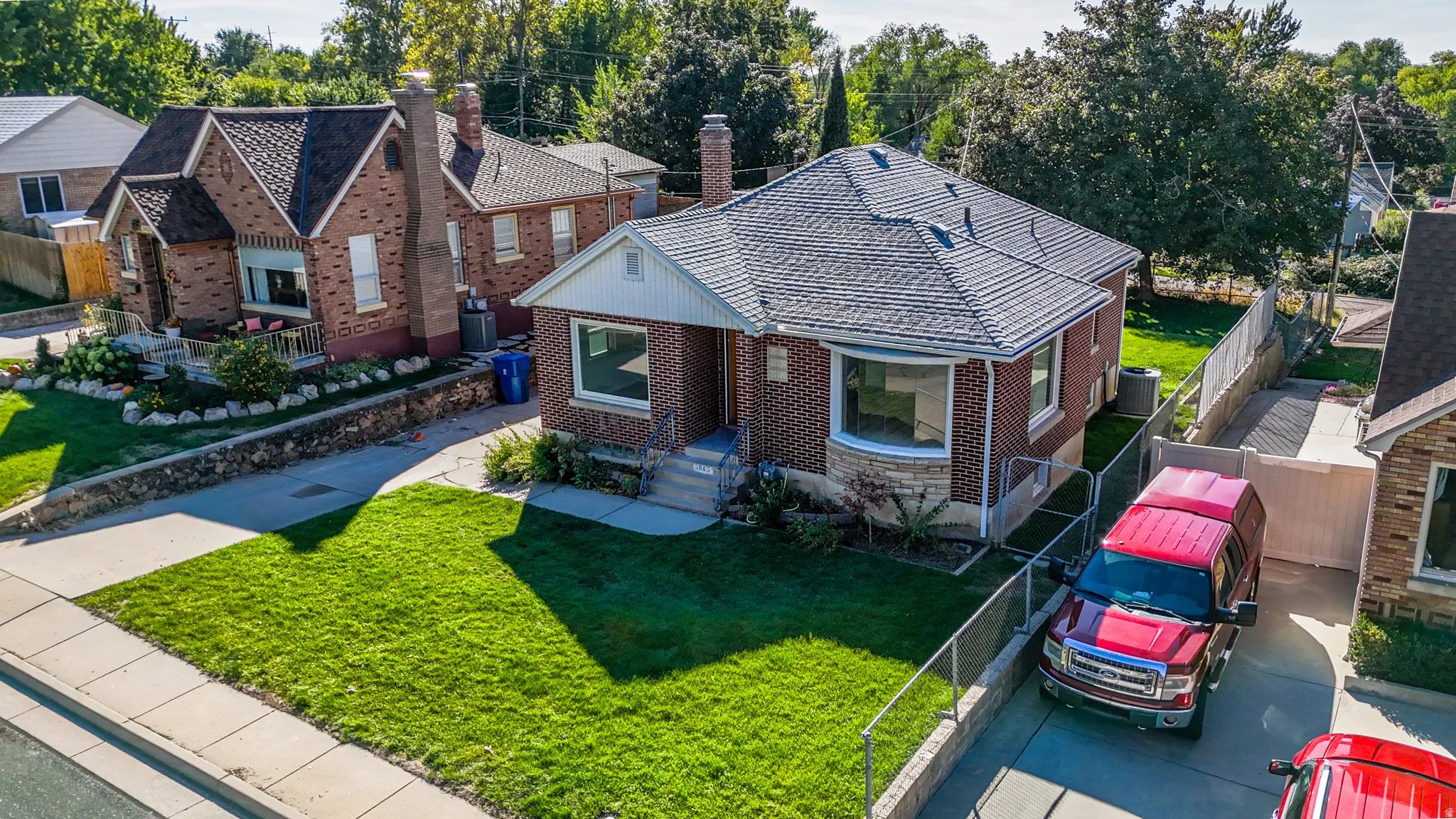 Brick exterior with a shingle roof