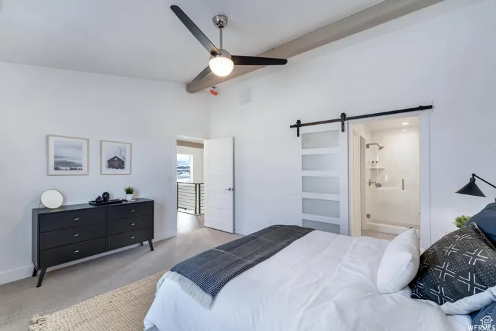 Vaulted ceiling with exposed wood-finish beam