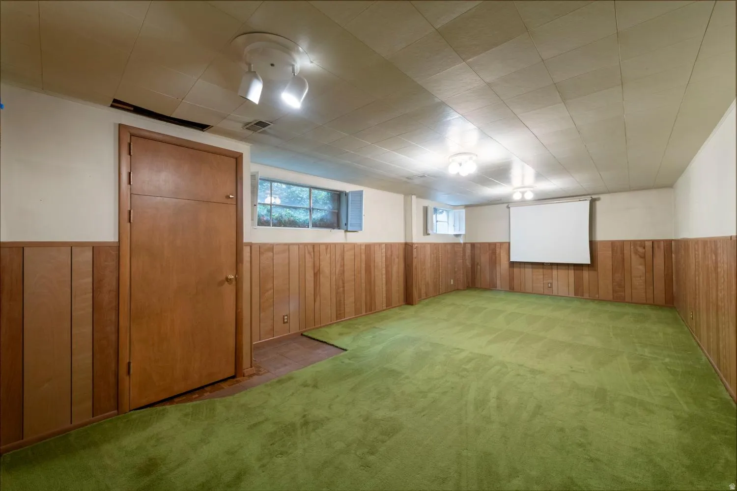 Wood paneling and white painted walls