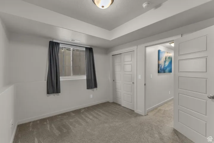 Neutral-toned carpeting throughout