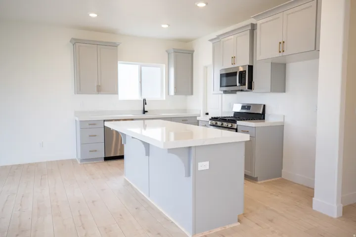 Spacious kitchen with island and upgraded cabinets