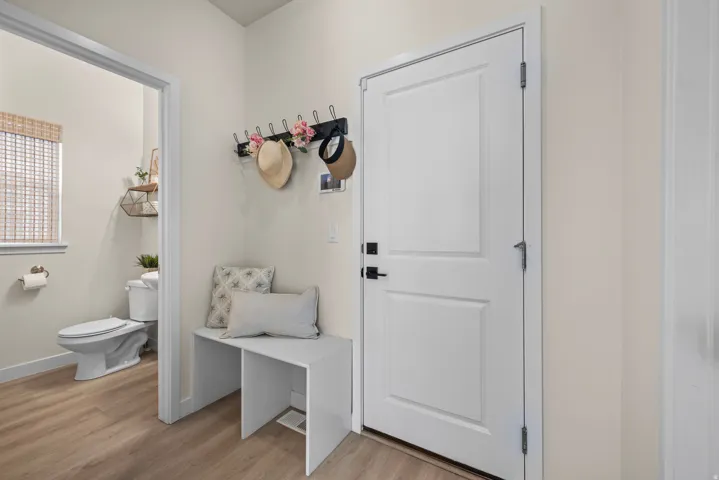Wood-finish flooring throughout the space