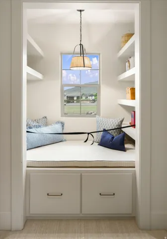 Built-in window seat with integrated storage drawers