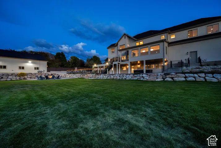 Expansive lawn with rock retaining walls