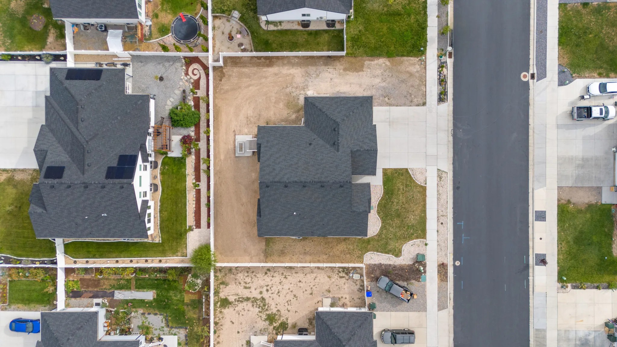 Asphalt shingle roof with solar panels
