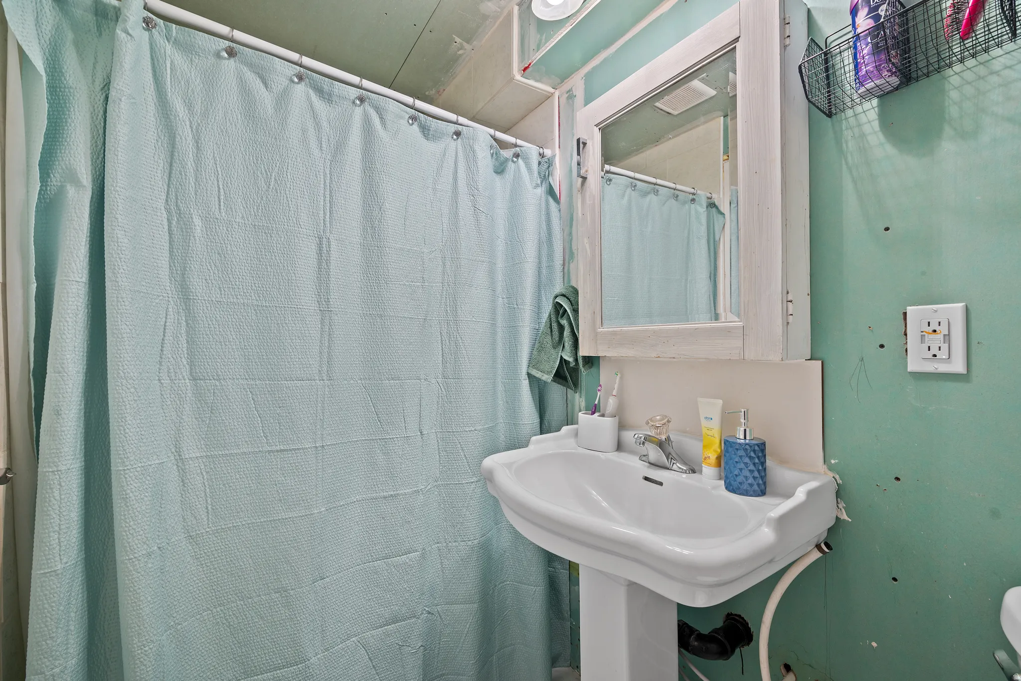 Pedestal sink with built-in faucet, wall-mounted medicine cabinet with mirror